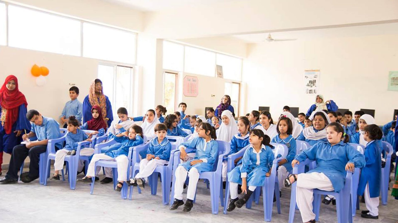 Students and staff gathered in the institute’s main hall
